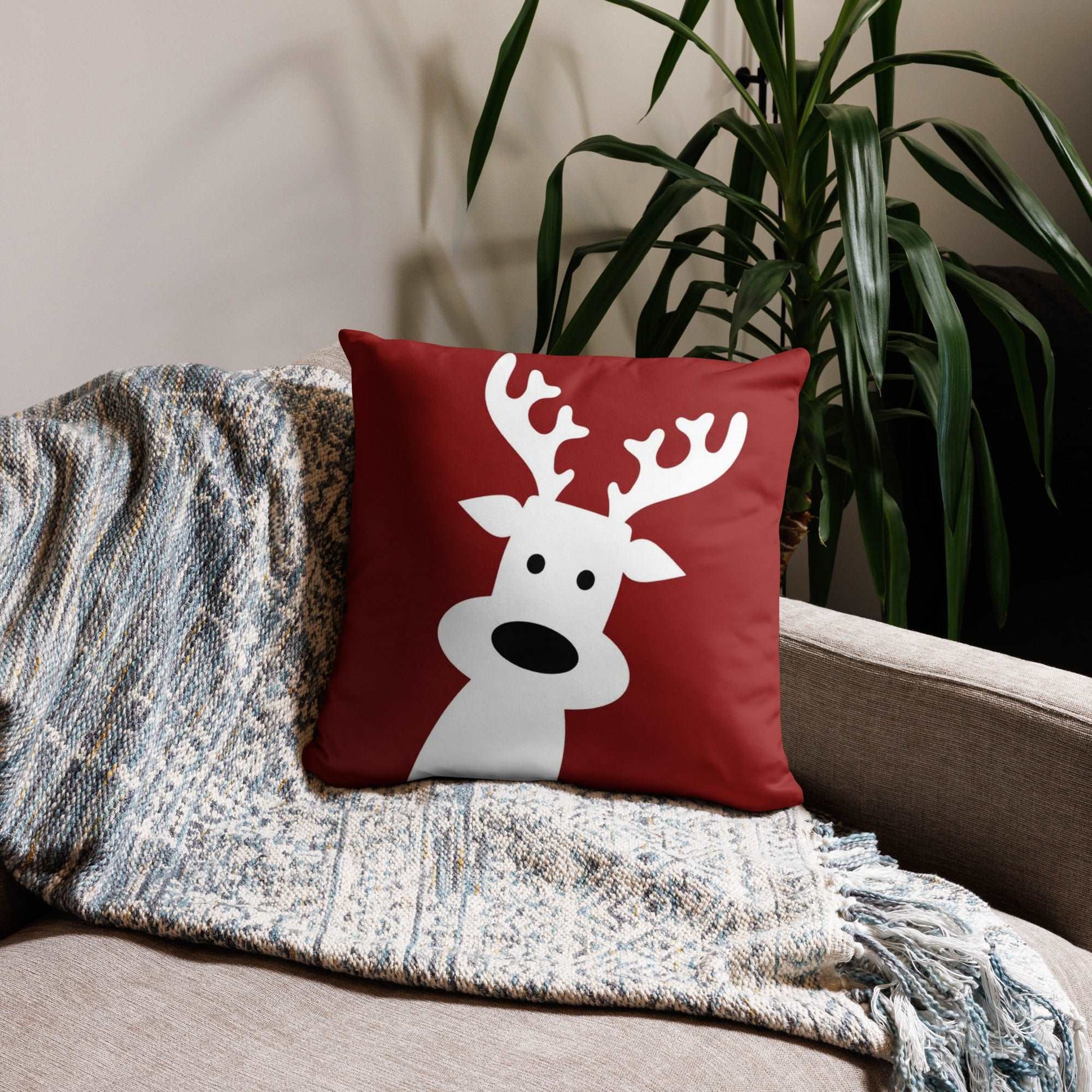 Christmas Reindeer Throw Pillow on Red Background